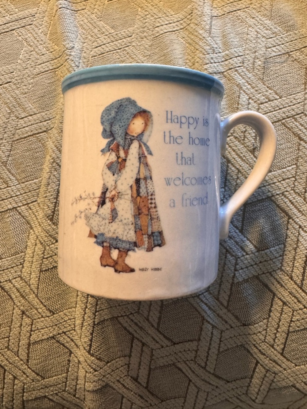 Holly Hobbie Mug ~ Blue Girl ~ "Happy is the home that welcomes a friend"